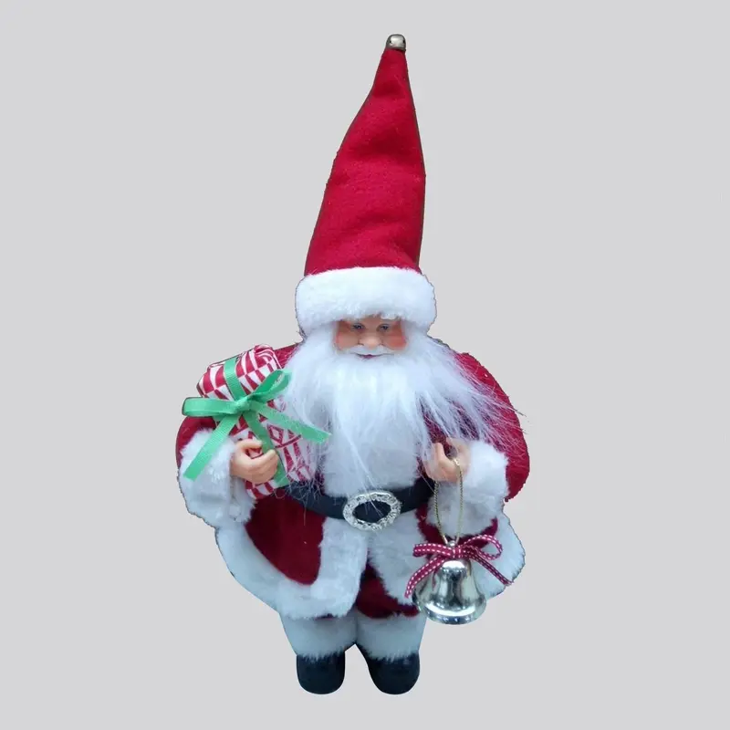 Santa Claus holding presents and bell