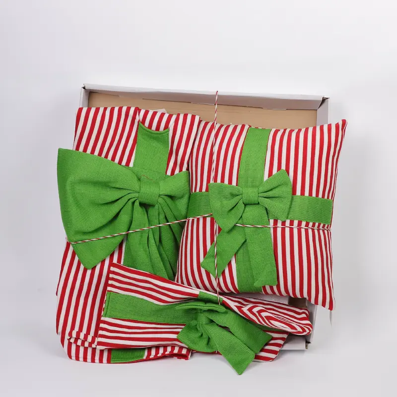 Red and white striped pillow with green ribbon, Tree Skirt and Stocking