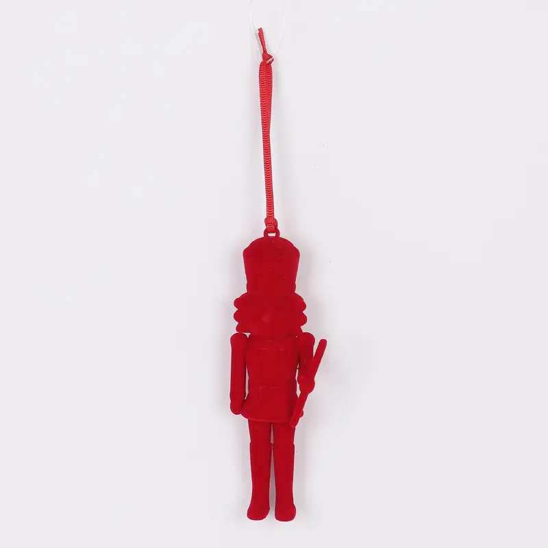 Red flocked Christmas nutcracker ornament