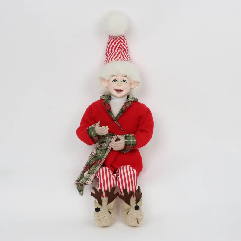 Christmas elf wearing cotton pajamas and slippers