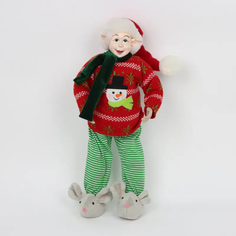 Christmas elf with velvet scarf and cotton stripped pants wearing mouse slippers and snowman sweater