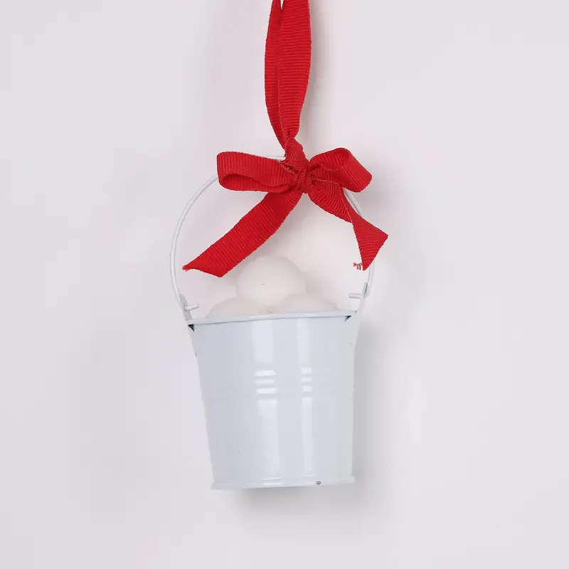 A bucket of snowball ormamentin silver bucket