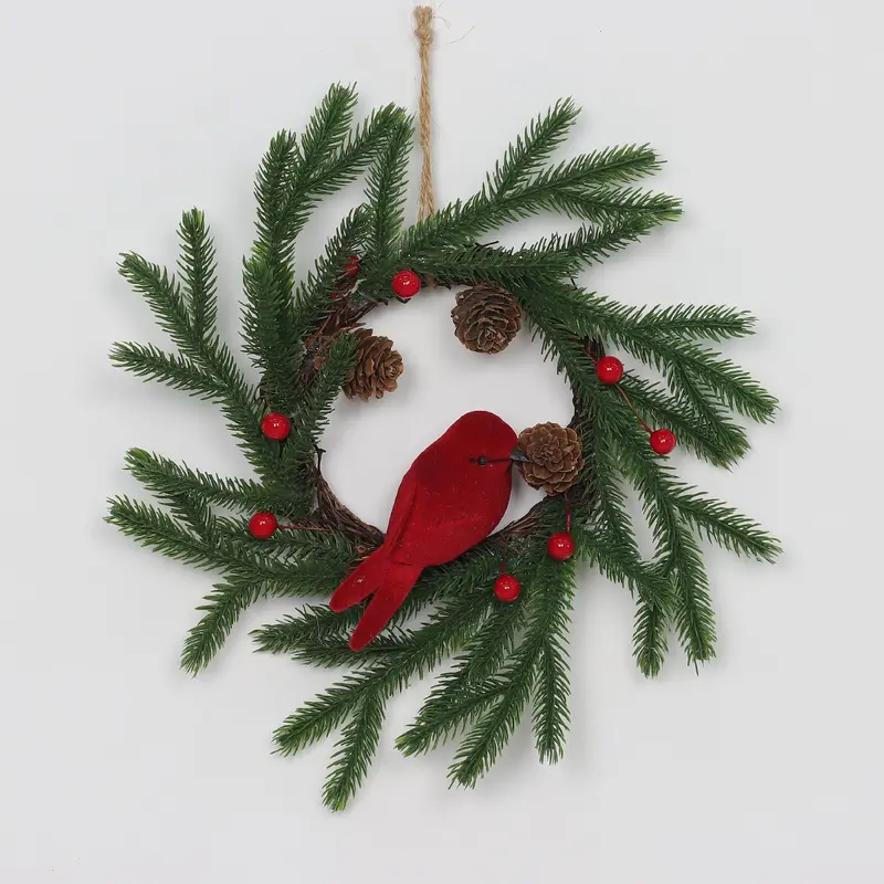 Christmas wreath withpinecones and cardinal bird ornament