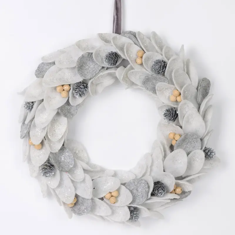 Silver wreath with pinecones and berries