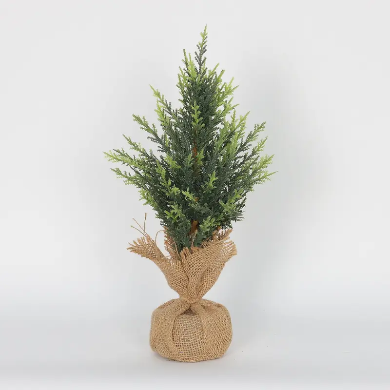 Evergreen tree with weighed bottom
