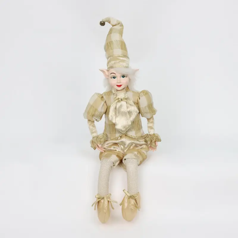 Female christmas elf in golden outfit