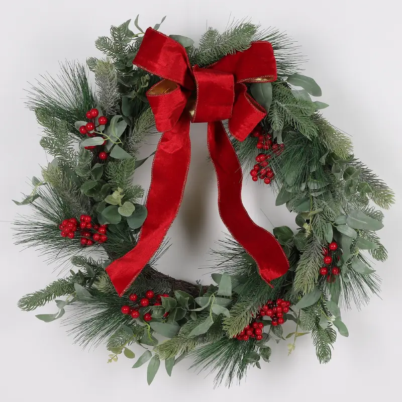 Wreath with large red bow and berries