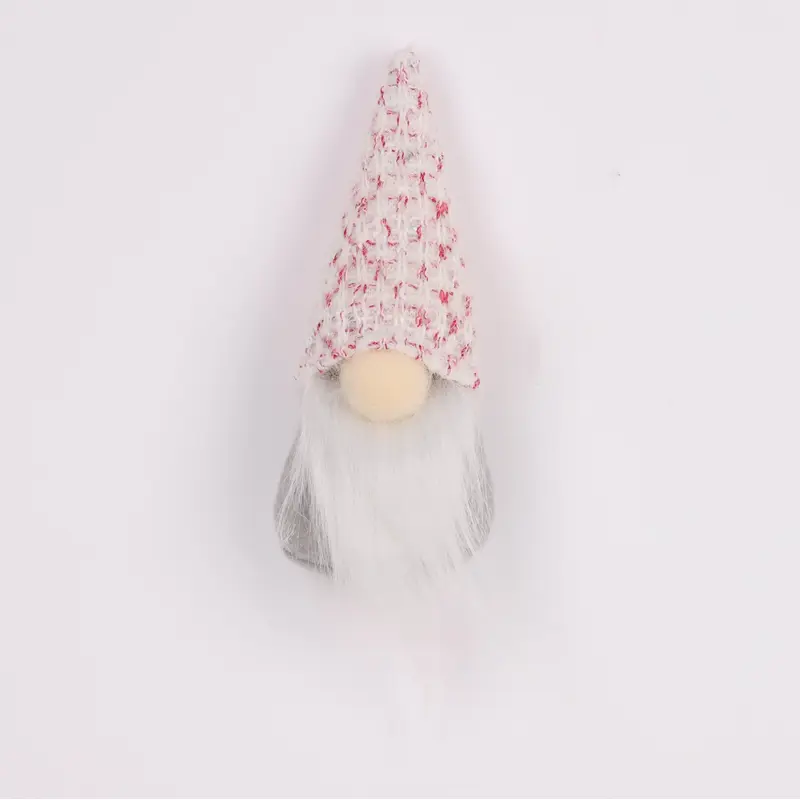 Fabric gnome with pink clothing ornament