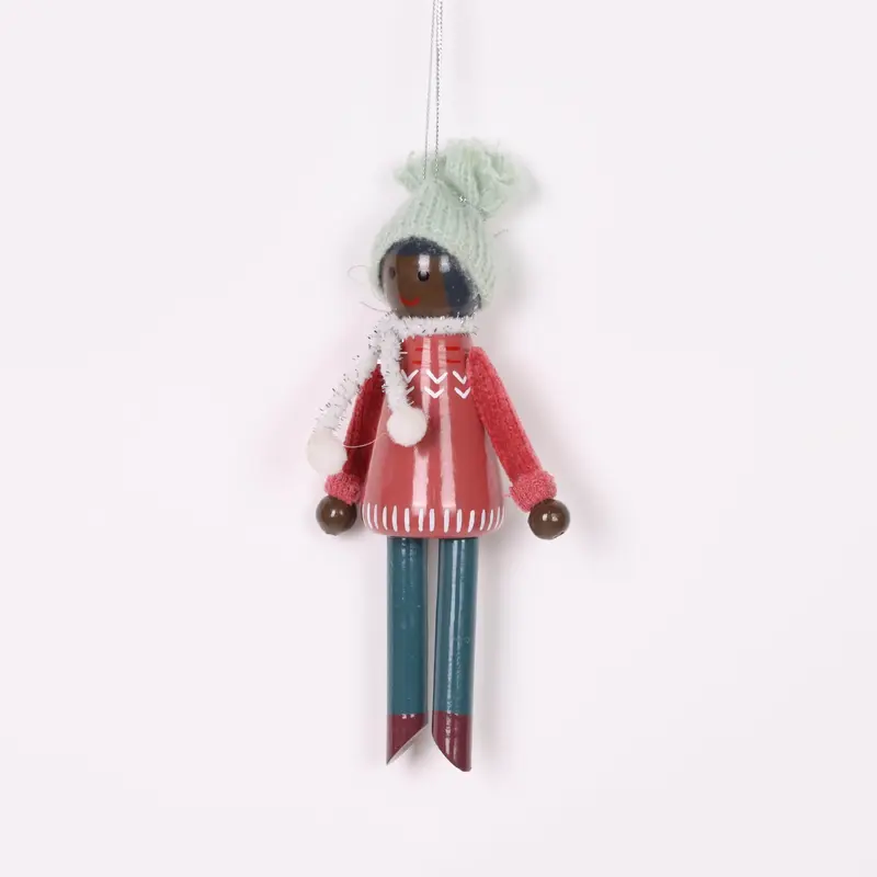 Child in knitted hat and sweater ornament