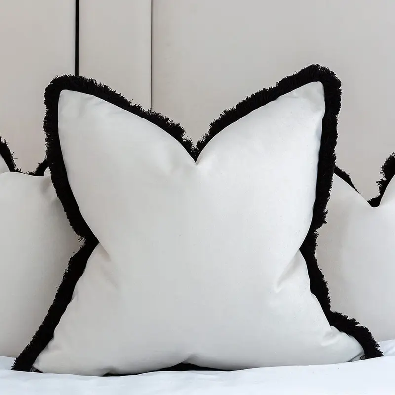 Ari Cream Velvet Cushion with Black Fringe Detail - 50x50cm
