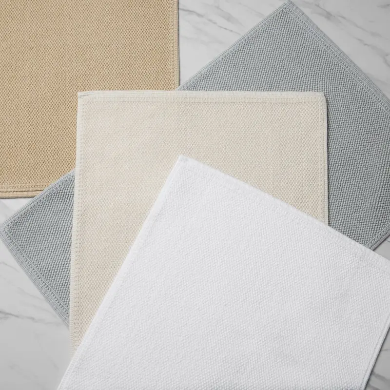 Osini Bath Rugs by Sferra Linens